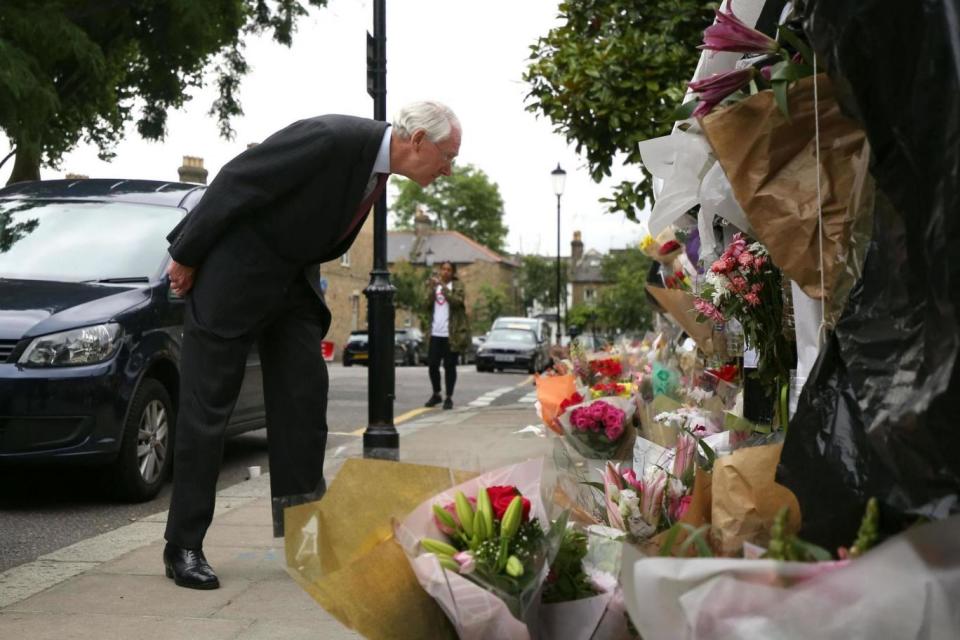 Sir Martin Moore-Bick visiting the scene of the Grenfell Tower inquiry (PA)