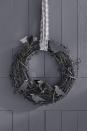 <p>Another wreath with a simple base of branches, this is a perfect Halloween decoration that features exactly zero hints of orange (because, hey, that's not everyone's thing). </p><p><em><a href="https://www.countryliving.com/diy-crafts/g1988/fall-craft-projects/?slide=17" rel="nofollow noopener" target="_blank" data-ylk="slk:Get the tutorial at Country Living.;elm:context_link;itc:0;sec:content-canvas" class="link "><strong>Get the tutorial at Country Living.</strong></a></em></p>