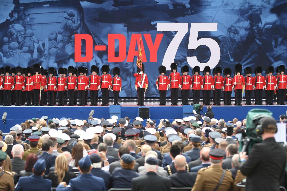 Guardsmen parade on stage during an event to commemorate the 75th anniversary of the D-Day landings, in Portsmouth, southern England, on June 5, 2019. - US President Donald Trump, Queen Elizabeth II and 300 veterans are to gather on the south coast of England on Wednesday for a poignant ceremony marking the 75th anniversary of D-Day. Other world leaders will join them in Portsmouth for Britain's national event to commemorate the Allied invasion of the Normandy beaches in France -- one of the turning points of World War II. (Photo by Daniel LEAL-OLIVAS / AFP)        (Photo credit should read DANIEL LEAL-OLIVAS/AFP/Getty Images)