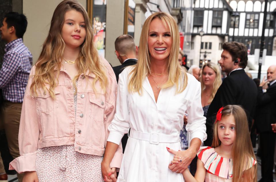 Amanda Holden with daughters Alexa and Hollie (Credit: PA)