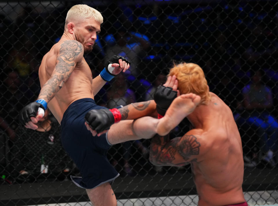 LAS VEGAS, NEVADA – SEPTEMBER 05: (L-R) Serhiy Sidey of Ukraine kicks Ramon Taveras in a bantamweight fight during Dana White’s Contender Series season seven, week five at UFC APEX on September 05, 2023 in Las Vegas, Nevada. (Photo by Cooper Neill/Zuffa LLC via Getty Images)