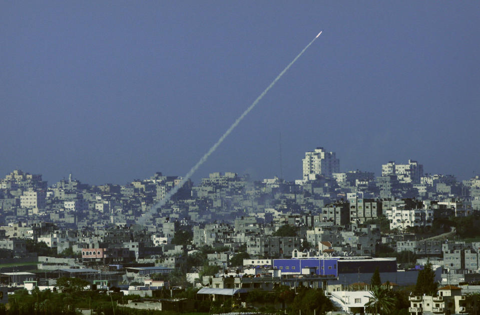 FILE - In this Jan 7, 2009, file photo, a rocket fired by Palestinian militants in the Gaza Strip is seen from southern Israel, near Israel's border with the Gaza Strip. Over the years, the Islamic militant Hamas group has built up a large arsenal of rockets and missiles that have evolved from rudimentary short-range projectiles into powerful weapons capable of striking virtually anywhere in Israel. (AP Photo/Dan Balilty, File)