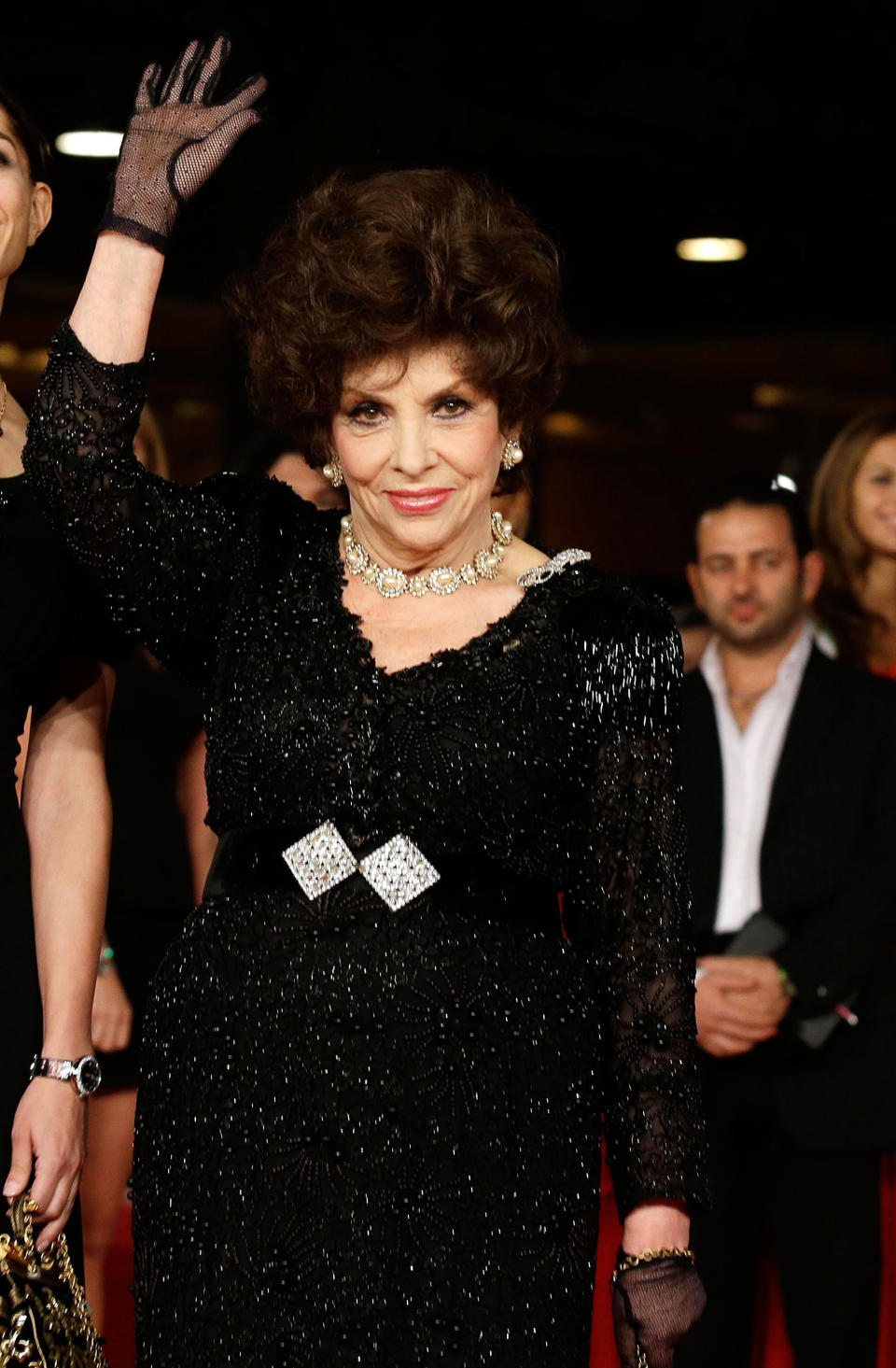 FILE - In this Nov. 16, 2012 file photo, actresses Gina Lollobrigida poses for photographers as they arrive for the screening of a documentary on Miss Italy during the 7th edition of the Rome International Film Festival in Rome. Lollobrigida turns 93 on July. 4. (AP Photo/Gregorio Borgia, File)