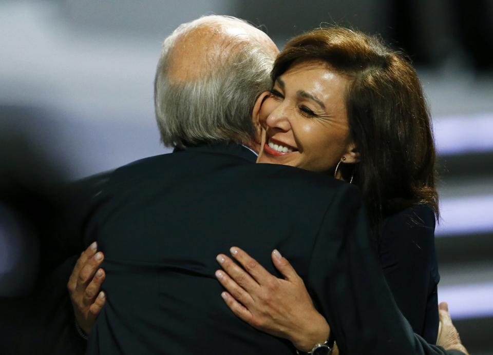 Linda Barras embraces her partner Sepp Blatter before the election process at the 65th FIFA Congress in Zurich, Switzerland, May 29, 2015. Embattled FIFA president Sepp Blatter called on members of world soccer's governing body to stick together to stamp out corruption in the wake of the latest scandal to hit the game. REUTERS/Arnd Wiegmann