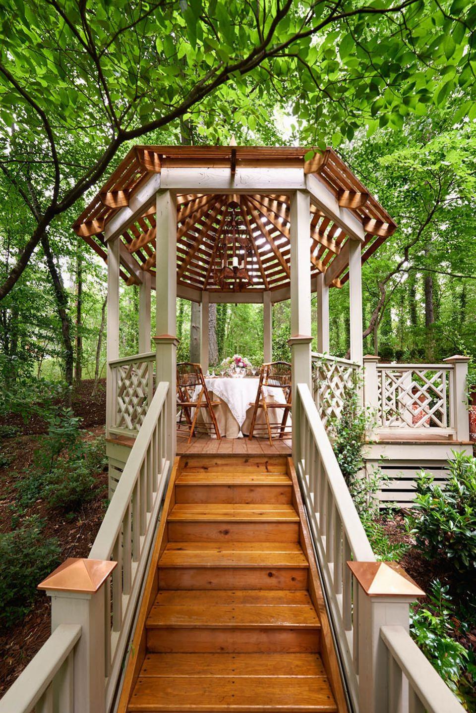 a wooden staircase with a gazebo