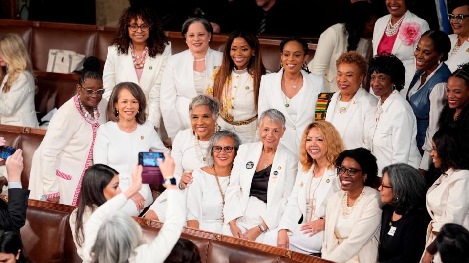PHOTO: Women members of the House of Representatives, pose for photos before President Joe Biden arrives to deliver his State of the Union address to a joint session of Congress, at the Capitol in Washington, Mar. 7, 2024.  (J. Scott Applewhite/AP)