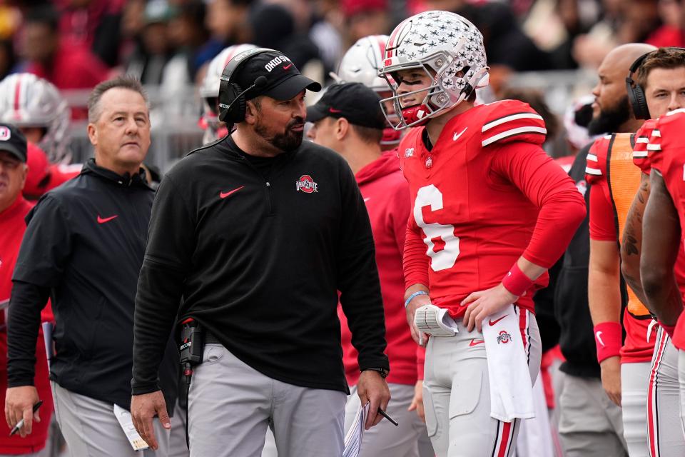 Oct 21, 2023; Columbus, Ohio, USA; Ohio State Buckeyes head coach Ryan Day talks to quarterback Kyle McCord (6) during the first half of the NCAA football game against the Penn State Nittany Lions at Ohio Stadium.