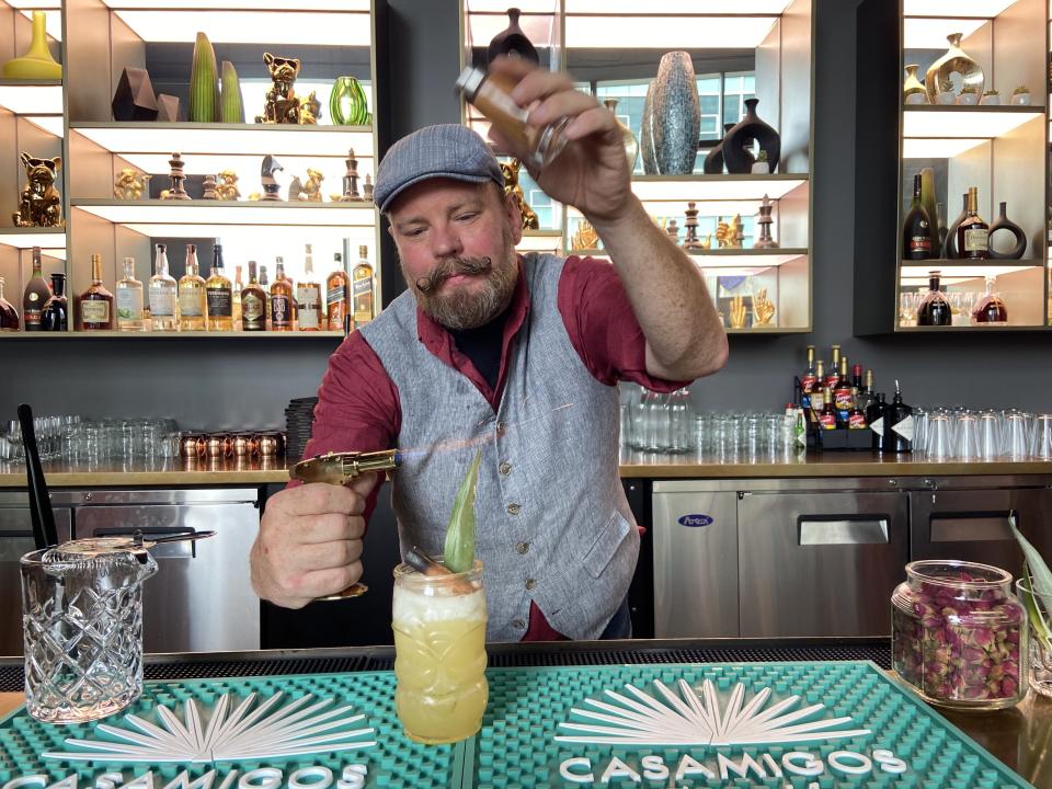 A bartender at Look Cinemas on West 57th finishes off one of his creations (Look Cinemas)