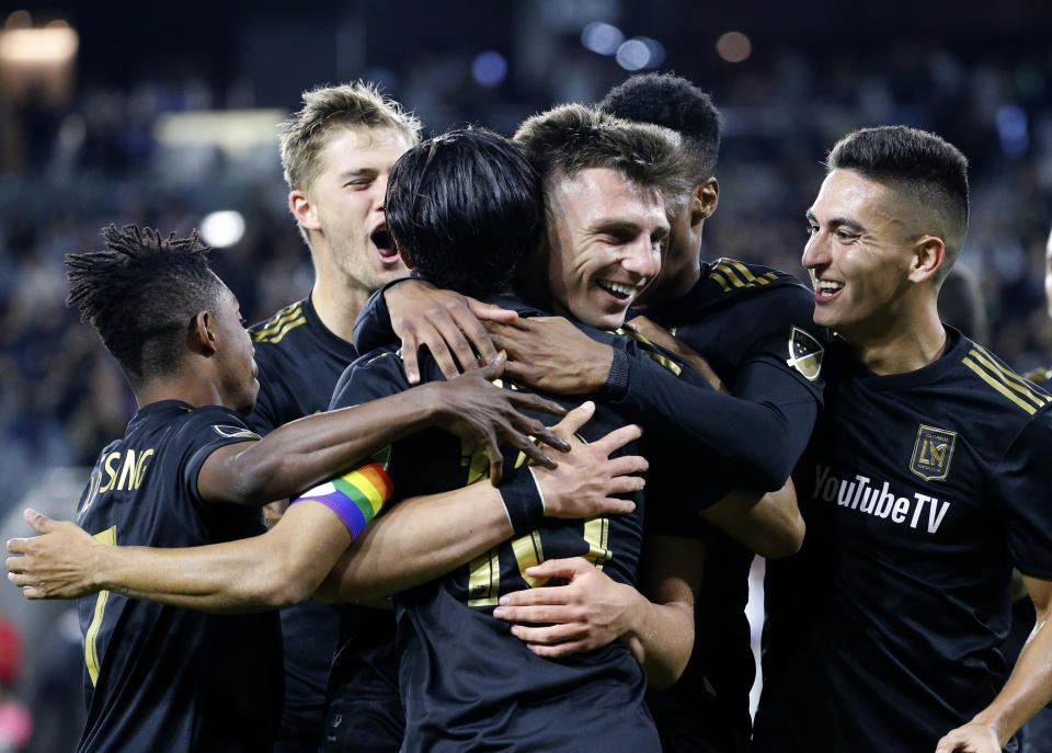 Los Angeles FC defender Tristan Blackmon, third from right, celebrates his goal with teammates during the second half of an MLS soccer match against the Montreal Impact in Los Angeles, Friday, May 24, 2019. LAFC won 4-2. (AP Photo/Ringo H.W. Chiu)