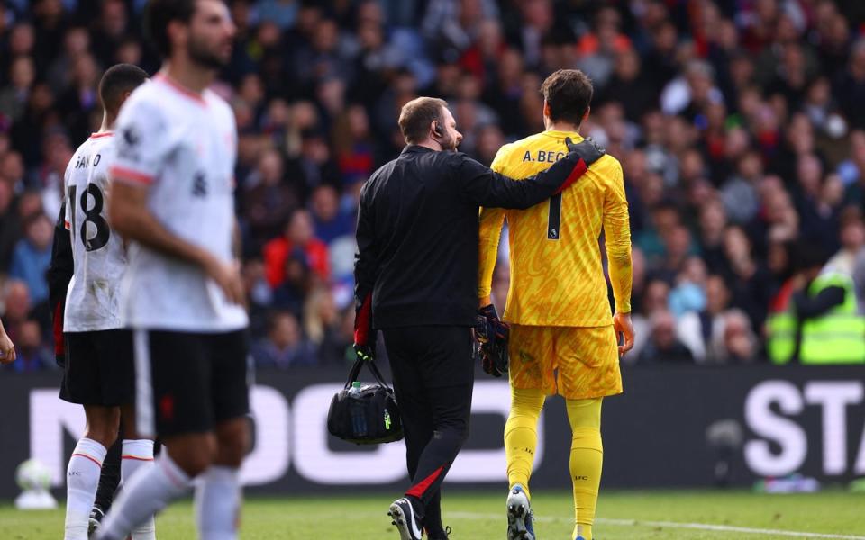 The Liverpool goalkeeper limped off at Selhurst Park (REUTERS)