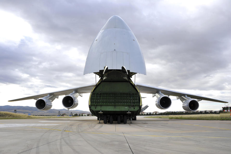 A Russian transport aircraft, carrying military vehicles and equipment, parts of the S-400 air defense systems, is seen at Murted military airport in Ankara, Turkey, Friday, July 12, 2019. The first shipment of a Russian missile defense system has arrived in Turkey, the Turkish Defense Ministry said Friday, moving the country closer to possible U.S. sanctions and a new standoff with Washington. The U.S. has strongly urged NATO member Turkey to pull back from the deal, warning the country that it will face economic sanctions. (Turkish Defence Ministry via AP, Pool)