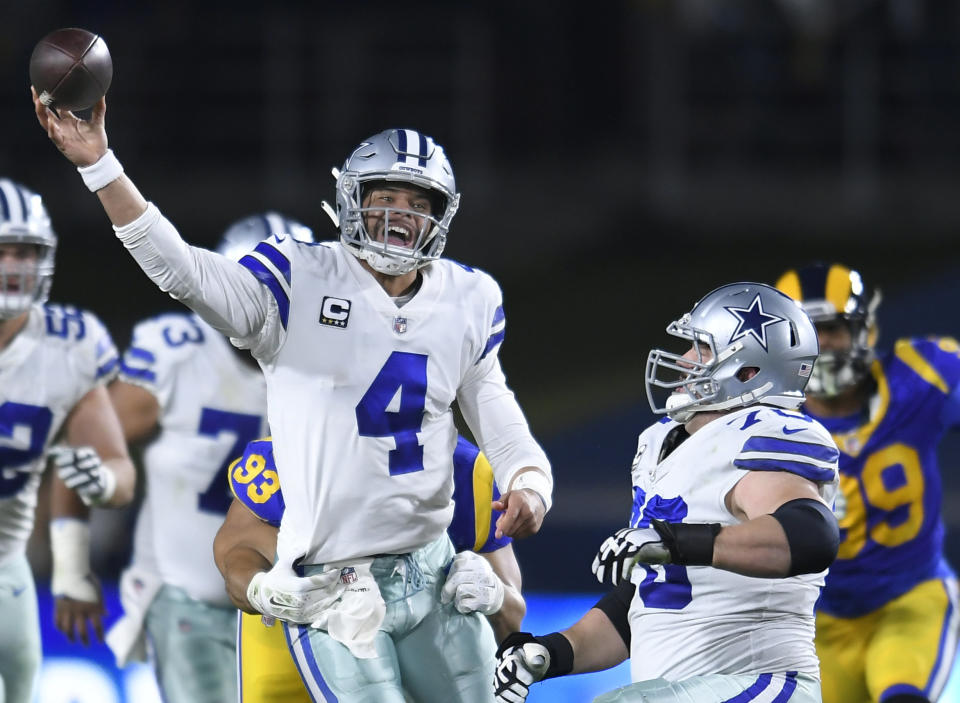 LOS ANGELES, CA - JANUARY 12: Dallas Cowboys quarterback Dak Prescott #4 passes against the Los Angeles Rams at Los Angeles Memorial Coliseum on January 12, 2019 in Los Angeles, California. (Photo by John McCoy/Getty Images)