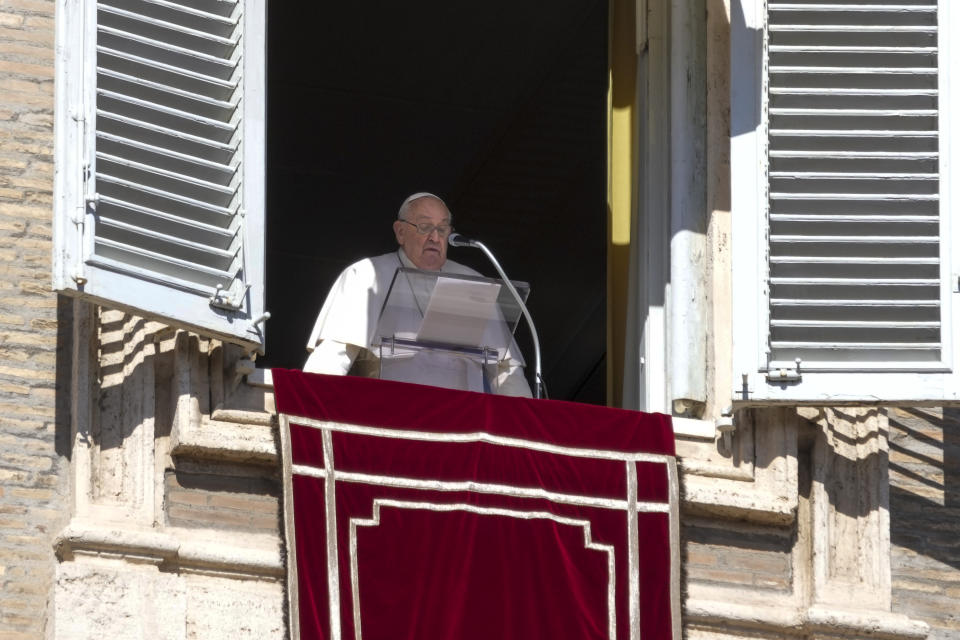 Pope Francis appears at the window of his studio overlooking St. Peter's Square at The Vatican for the traditional Sunday noon blessing of faithful and pilgrims gathered in the Square for the Angelus prayer, Sunday, Feb. 25, 2024. Pope Francis had canceled an audience scheduled for Saturday as a precaution after coming down with mild flu, the Vatican press office said in a short statement, without adding further details. (AP Photo/Gregorio Borgia)