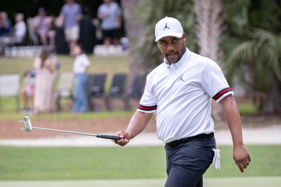 Akron native Harold Varner III gestures to the crowd after making a birdie putt on the 15th hole during the third round of the RBC Heritage golf tournament on April 16 in Hilton Head Island, S.C.  Varner is one of four players with area ties competing in the U.S. Open this week. [Stephen B. Morton/Associated Press]