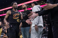 Cleveland Cavaliers guard Donovan Mitchell (45) walks to the bench as the Cavaliers trailed the Boston Celtics by more than 20 points during the second half of Game 1 of an NBA basketball second-round playoff series Tuesday, May 7, 2024, in Boston. (AP Photo/Charles Krupa)