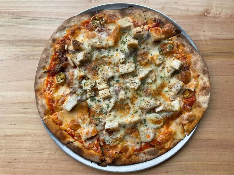 Order the Margauxʼs Southern Heat — grilled chicken, house blend of cheeses, Buffalo sauce, red onions and jalapenos, served with a side of ranch.