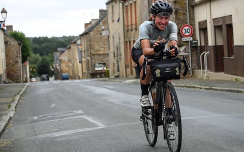 Ultra-distance cyclists are entirely self-supported. They must carry everything with them on their bikes - Credit: AFP