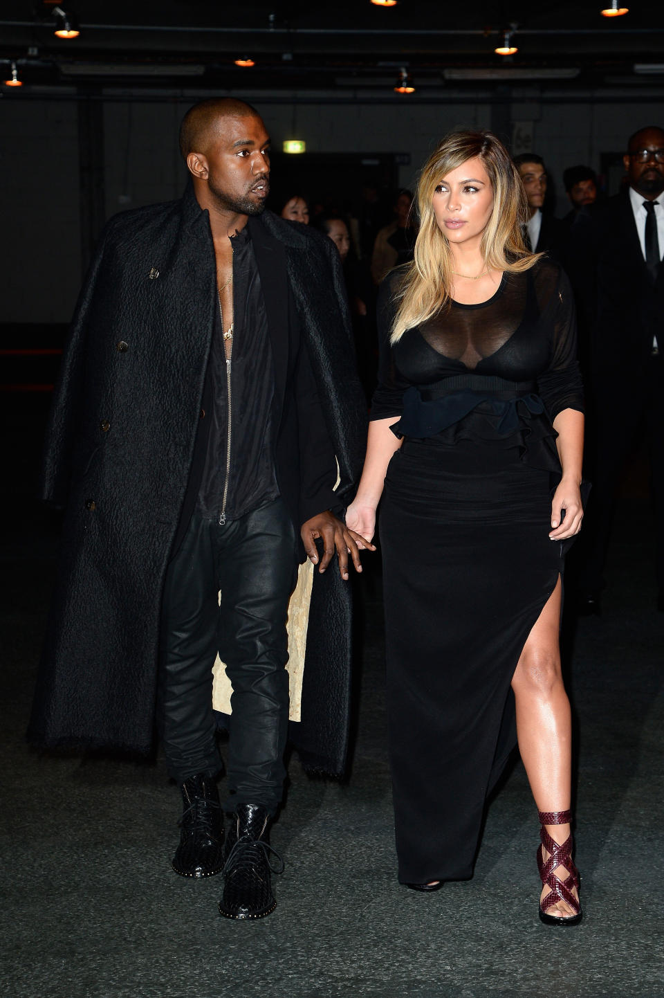 PARIS, FRANCE - SEPTEMBER 29:  Kim Kardashian and Kanye West attend the Givenchy show as part of the Paris Fashion Week Womenswear  Spring/Summer 2014 on September 29, 2013 in Paris, France.  (Photo by Pascal Le Segretain/Getty Images)