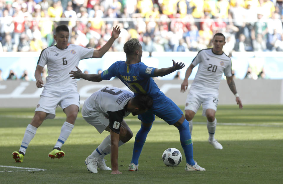 Brazil’s Neymar flops in the penalty area against Costa Rica. (AP Photo/Petr David Josek)