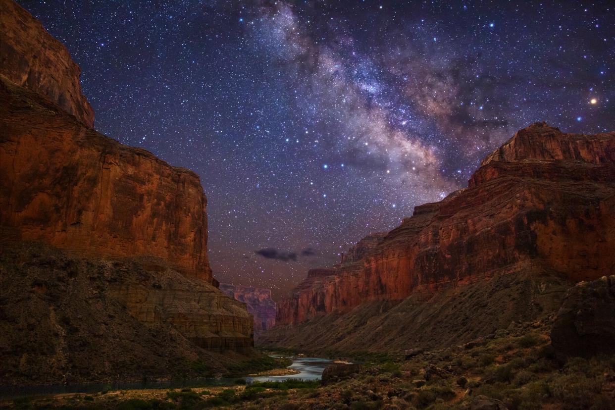Milky Way stars over Grand Canyon and the Colorado River from Nankoweap Canyon area,