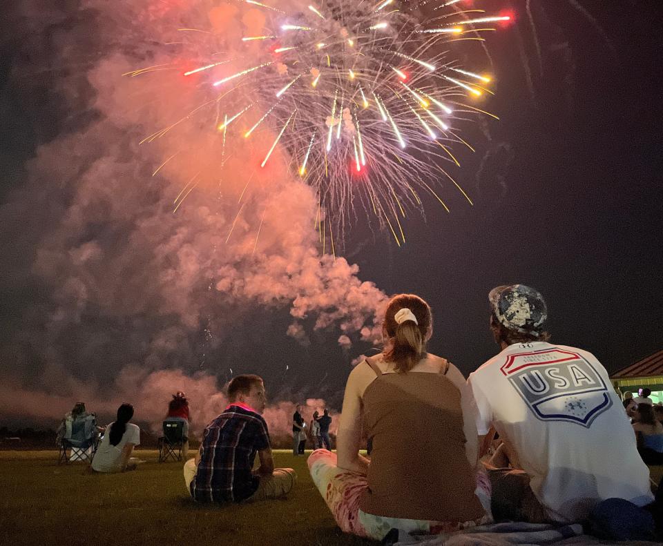 FILE - Families watch fireworks at Hephzibah's inaugural Fireworks Extravaganza at the Hephzibah Agricultural Center on Saturday, July 1, 2023. The agricultural center will have a similar fireworks display on New Year's Eve.