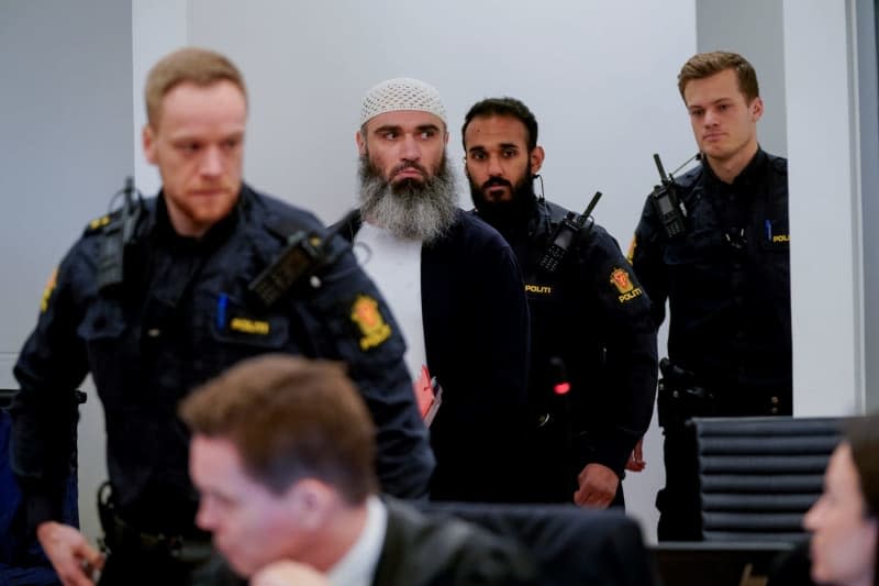 Zaniar Matapour, a Norwegian with an Iranian family background, is led into the courtroom 250 in Oslo courthouse, where he is on trial for Oslo gay bar shooting in 2022. Lise Åserud/ntb/dpa