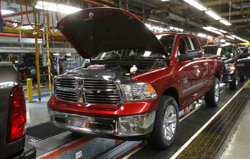 FILE PHOTO: An assembly line with 2014 Ram 1500 pickup trucks is seen at the Warren Truck Plant in Warren, Michigan, U.S. on September 25, 2014. REUTERS/Rebecca Cook/File Photo