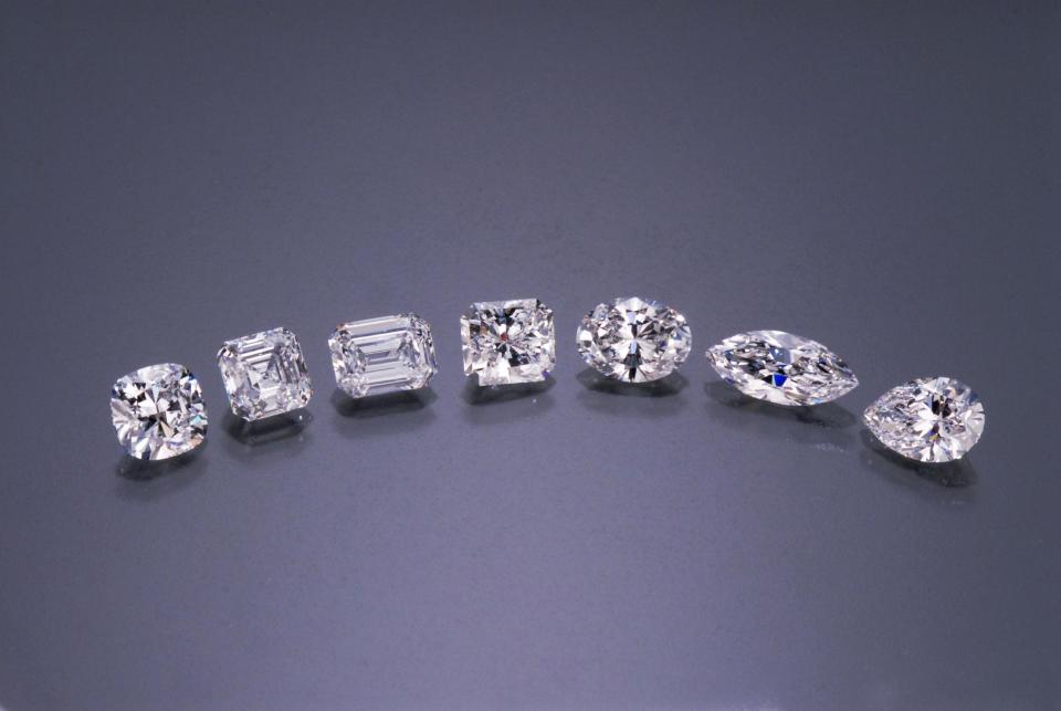 This publicity photo provided by Gemological Institute of America shows seven diamond cut shapes, from left to right: cushion, Asscher, emerald, modified radiant, oval, marquise, and pear. A simple round cut is the most common for modern diamond rings but some of the more unusual shapes, which have a retro look, are experiencing a resurgence, according to Melissa Colgan, senior style editor for Martha Stewart Weddings, because they are being seen on celebrities. (AP Photo/Gemological Institute of America)