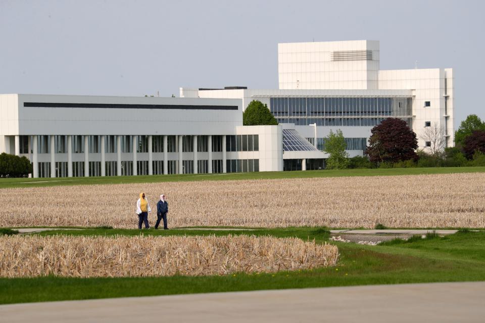 People walk along a path at Thrivent Ballard Operations Center located at 4321 N. Ballard Road Wednesday, May 17, 2023, in Appleton, Wis. Dan Powers/USA TODAY NETWORK-Wisconsin. 