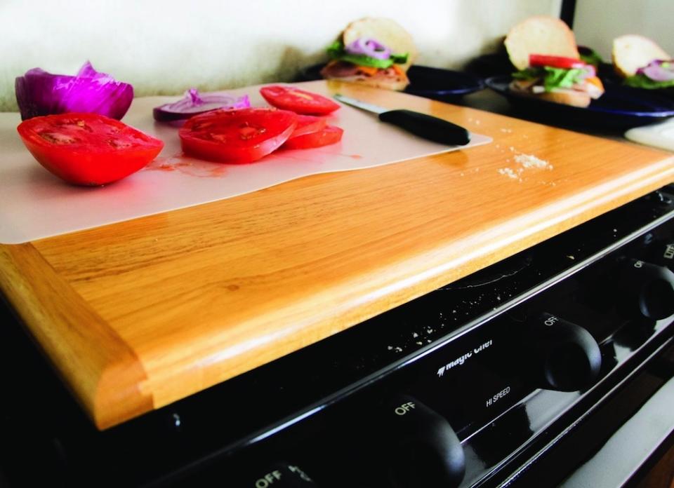 <body> <p>If there's a primary symptom of a too-small kitchen, it's the counterproductive dearth of counter space. Even a bit more countertop real estate would benefit your overall effectiveness (and sanity) when preparing meals. That's why the Camco Silent Top Stovetop Cover is so brilliant. No more sophisticated than a cutting board on legs, it sits over the range and instantly creates a few extra square feet of usable counter space. <em>Available on <a rel="nofollow noopener" href=" http://www.amazon.com/Camco-43521-Accents-Universal-Stovetop/dp/B000EDUTX6/ref=sr_1_sc_5?sr=8-5-spell&ie=UTF8&keywords=stovetopper&tag=bovi01-20%0Abovi01-20%0Abovi01-20&qid=1433682248" target="_blank" data-ylk="slk:Amazon;elm:context_link;itc:0;sec:content-canvas" class="link ">Amazon</a>; $50.</em> </p> <p><strong>Related: <a rel="nofollow noopener" href=" http://www.bobvila.com/slideshows/48709-10-extras-to-diy-for-your-kitchen?bv=yahoo" target="_blank" data-ylk="slk:10 Extras to DIY for Your Kitchen;elm:context_link;itc:0;sec:content-canvas" class="link ">10 Extras to DIY for Your Kitchen</a> </strong> </p> </body>