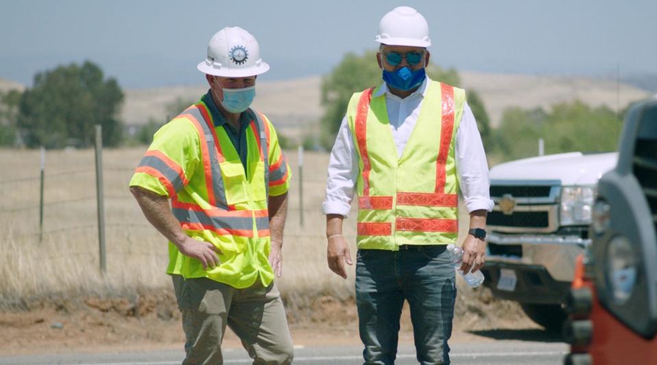 TechniSoil president Sean Weaver, right, looks over the work with contractor Darren Coughlin.