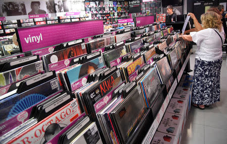 Shoppers browse record albums at an HMV music store in London, Britain, July 20, 2018. REUTERS/Toby Melville