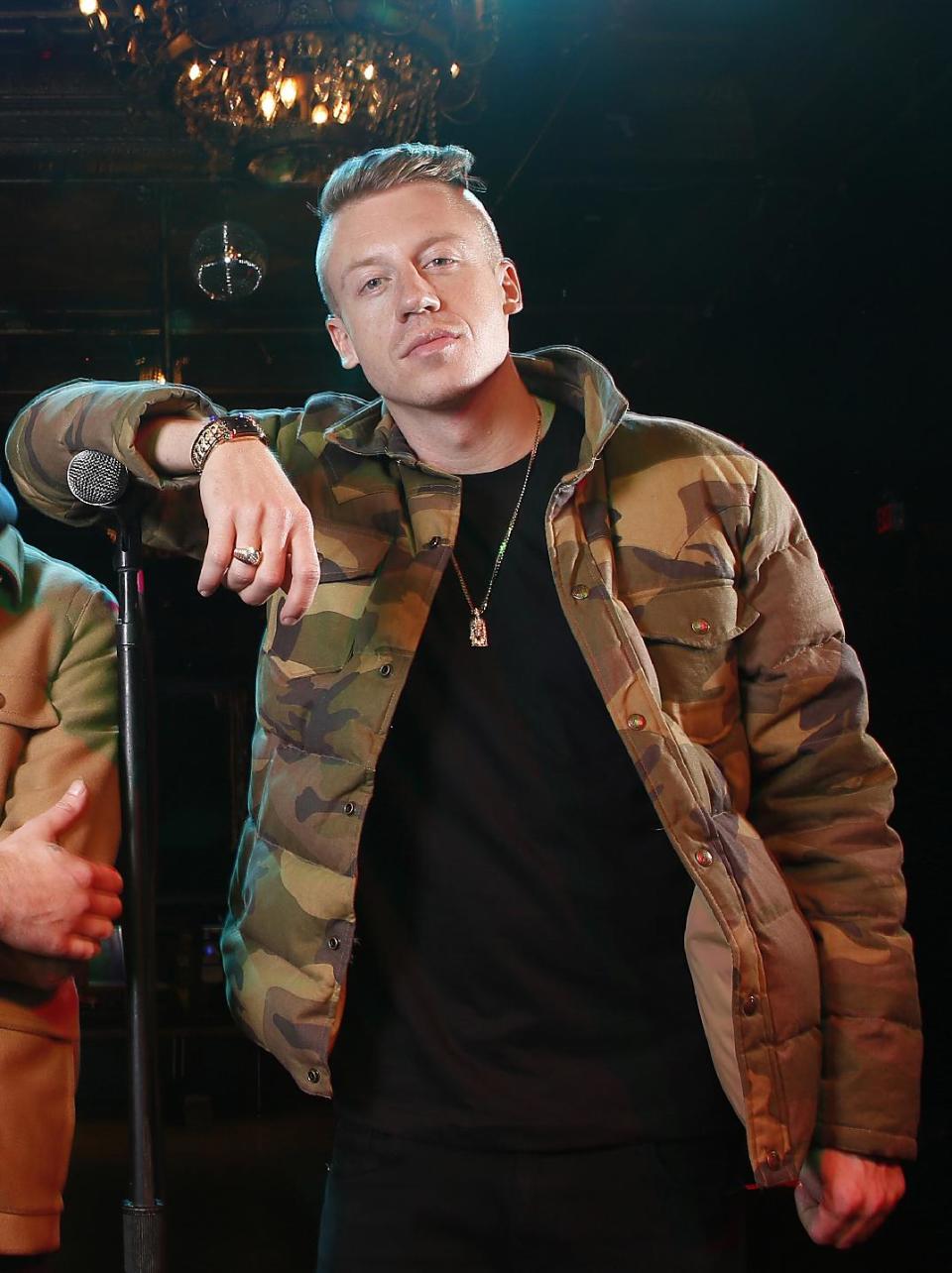 FILE - In this Nov. 20, 2012 file photo, American musician Ben Haggerty, better known by his stage name Macklemore poses for a portrait at Irving Plaza in New York. The Seattle rapper was named The Source’s 2013 Man Of The Year. (Photo by Carlo Allegri/Invision/AP, File)