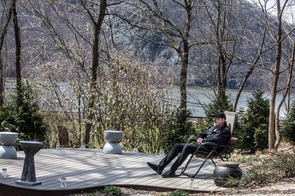Award-winning composer and writer Rupert Holmes sits outside his home overlooking the Hudson River in Cold Spring, N.Y. on April 11, 2023. Holmes latest book is u0022Murder Your Employer: The McMasters Guide to Homicide.u0022