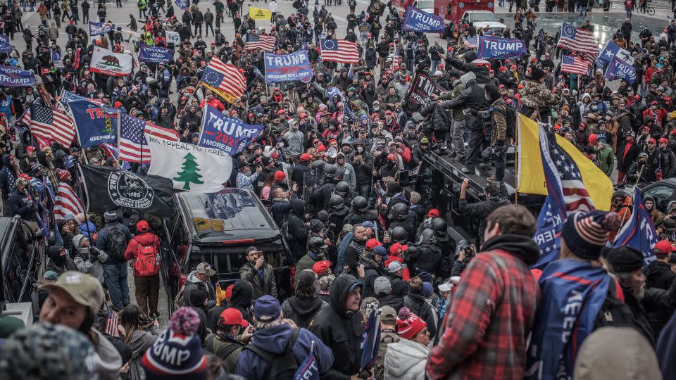 The "Appeal to Heaven" flag is seen in the left side of this photo from January 6, 2021, in Washington, DC, shortly before protesters stormed the US Capitol. - Shay Horse/NurPhoto/Getty Images