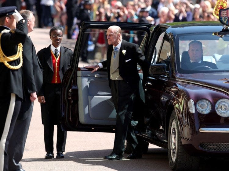 Queen Elizabeth II and the Prince Philip, Duke of Edinburgh arrive for the wedding ceremony of Britain's Prince Harry and US actress Meghan Markle at St George's Chapel, Windsor Castle on May 19, 2018 in Windsor, England.