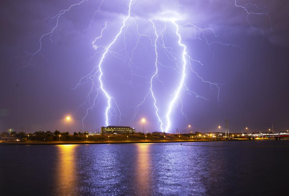 Lightning strikes over Tempe Town Lake during a monsoon storm Aug. 28, 2019.