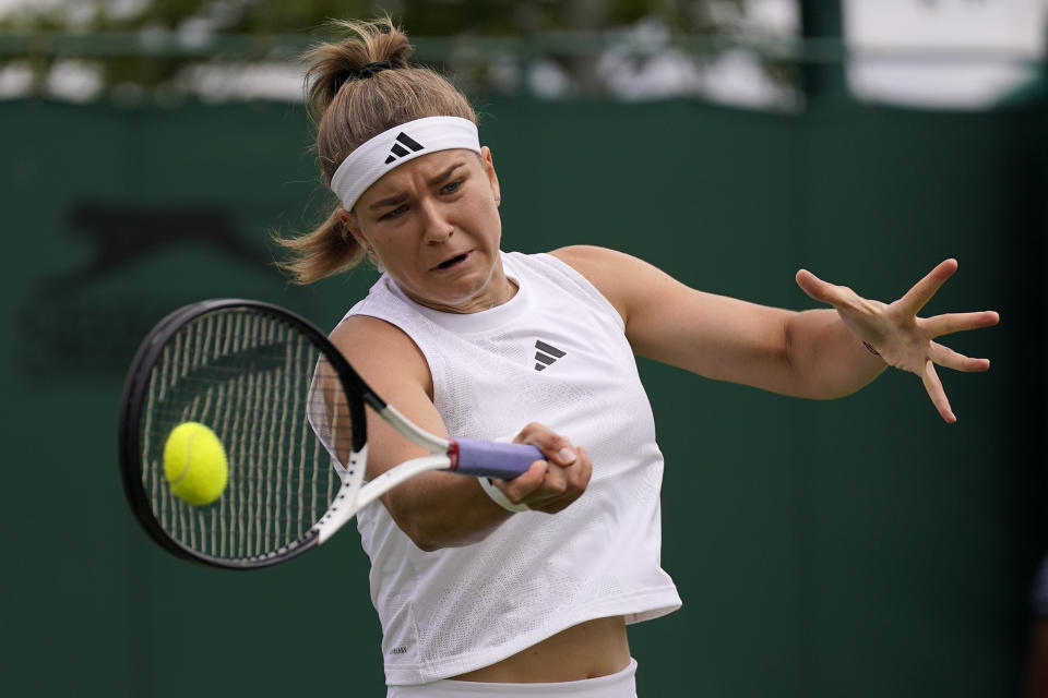 FILE - Czech Republic's Karolina Muchova returns to Germany's Jule Niemeier in a women's singles match on day four of the Wimbledon tennis championships in London, Thursday, July 6, 2023. Muchova is one of the women to watch at the U.S. Open, which begins at Flushing Meadows on Aug. 28.(AP Photo/Alberto Pezzali, File)