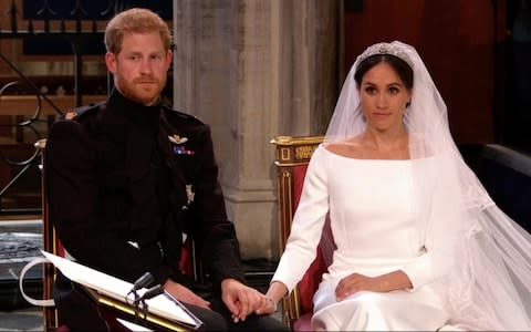 Prince Harry and Meghan Markle before they say their vows - Credit: Sky/AP