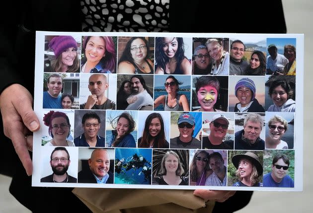 A photo collage of the 34 victims of the Sept. 2, 2019, fire aboard the dive boat, Conception, at Santa Cruz Island, is held by a family member arriving at federal court, on Oct. 25, 2023.