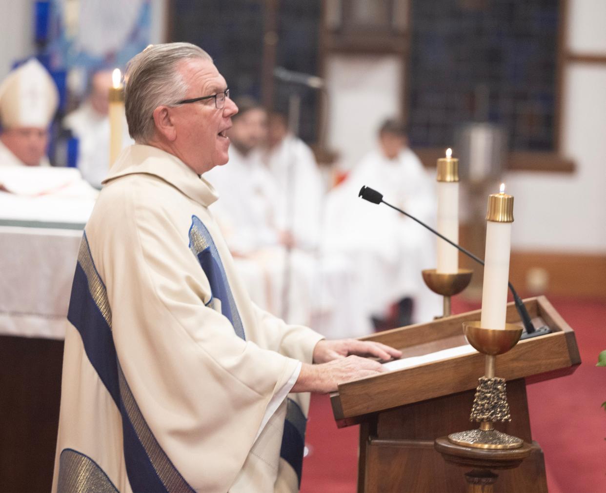 The Rev. Kevin Peters delivers a homily Monday, Nov. 6, 2023, at the last Mass celebrated at St. Mary's Church in Canton. Peters is pastor of the newly formed St. Francis of Assisi parish, which now includes St. Mary's.