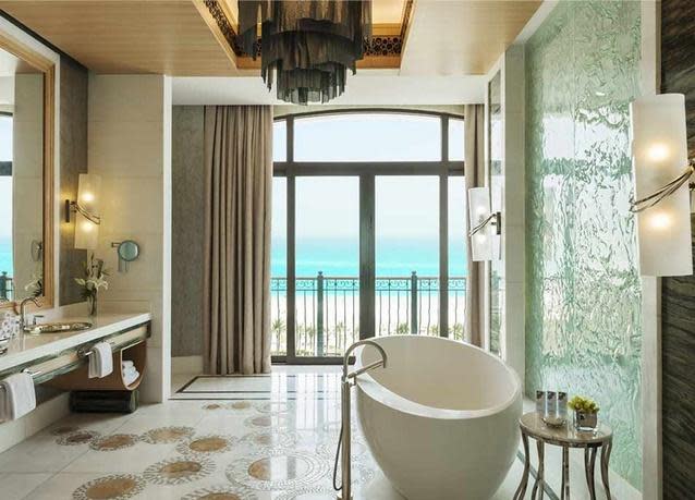 Other features include a spacious ocean-facing bathroom with a walk-in double shower and bathtub, an expansive walk-in closet and dressing area, a spa room and sauna. Photo: St Regis