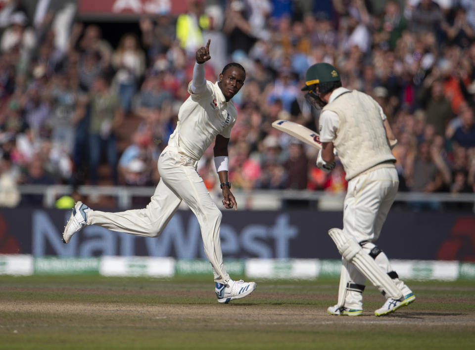 MANCHESTER, ENGLAND - SEPTEMBER 07: Jofra Archer of  England celebrates bowling Travis Head of Australia on day four of the fourth Specsavers test match at Emirates Old Trafford on September 7, 2019 in Manchester, England. (Photo by Visionhaus/Getty Images)