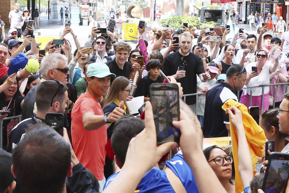 Rafael Nadal of Spain makes a public appearance in the Queen Street Mall ahead of the Brisbane International tennis tournament in Brisbane, Australia, Friday, Dec. 29, 2023. (AP Photo/Tertius Pickard)
