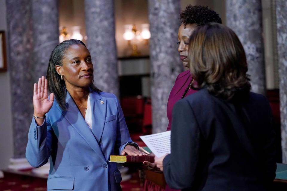 Vice President Kamala Harris, right, swears in Laphonza Butler to the U.S. Senate on Tuesday on Capitol Hill in Washington. California Gov. Gavin Newsom appointed Emily's List president Laphonza Butler to fill the vacant U.S. Senate seat left by Sen. Dianne Feinstein, who died Thursday at age 90.