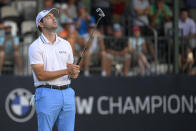 Patrick Cantlay reacts after missing a putt on the 17th green, the third playoff hole during the final round of the BMW Championship golf tournament, Sunday, Aug. 29, 2021, at Caves Valley Golf Club in Owings Mills, Md. (AP Photo/Nick Wass)