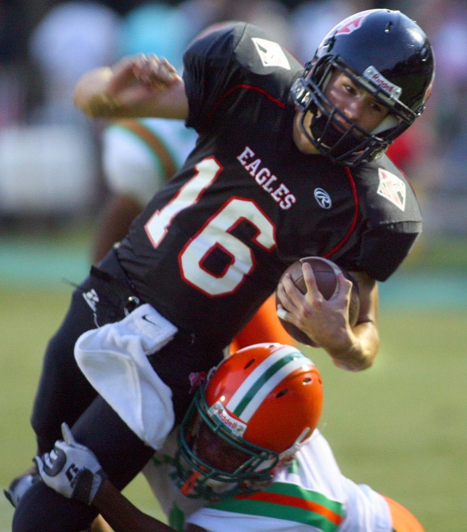 North Florida Christian quarterback Clint Trickett (16) makes a long gain up the middle against FAMU High, setting up their first touchdown, in the first half of their game Friday, Sept. 19, 2008 in Tallahassee, Fla.