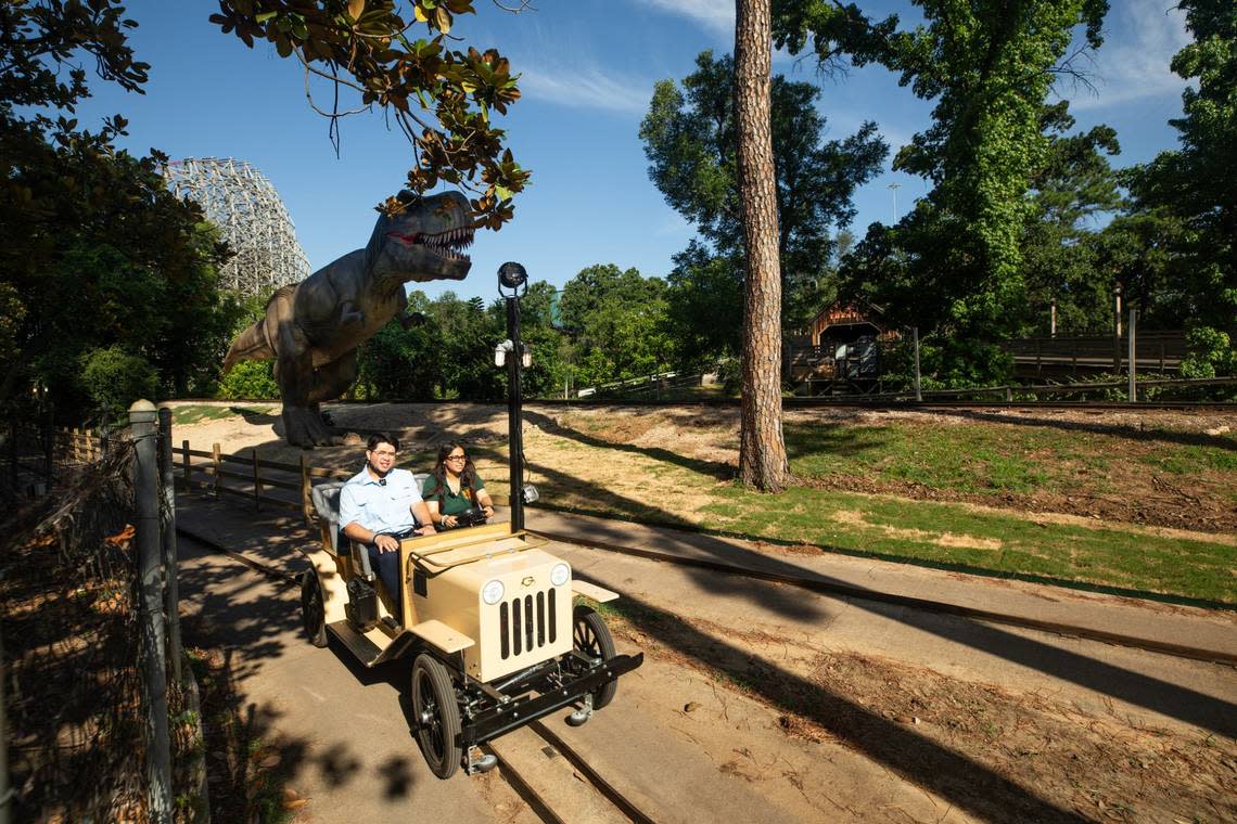 A worker gives a demonstration ride during an inside look of Six Flags Over Texas’ ride Dino Off Road Adventure on Friday, June 21, 2024 in Arlington.. The attraction first launched on Friday, June 14, 2024.