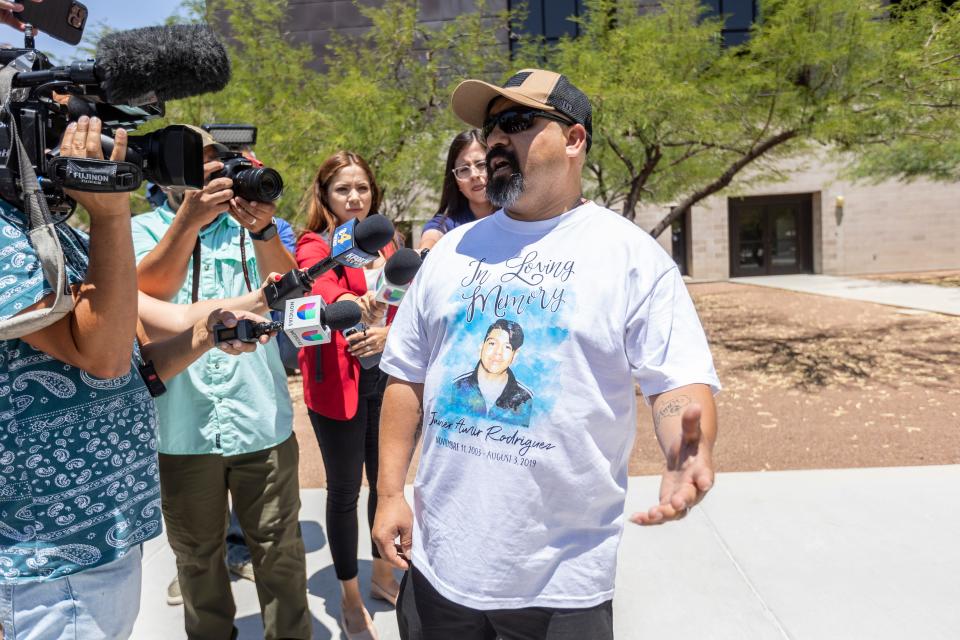Francisco Javier Rodriguez's son, Javier Amir Rodriguez, was shot dead by a racist who killed 23 people inside a Walmart in El Paso on Aug. 3, 2019. In this photo, he speaks to the media after giving his victim impact statement at the Albert Armendariz Sr. Federal Courthouse during sentencing for the shooter on Thursday.