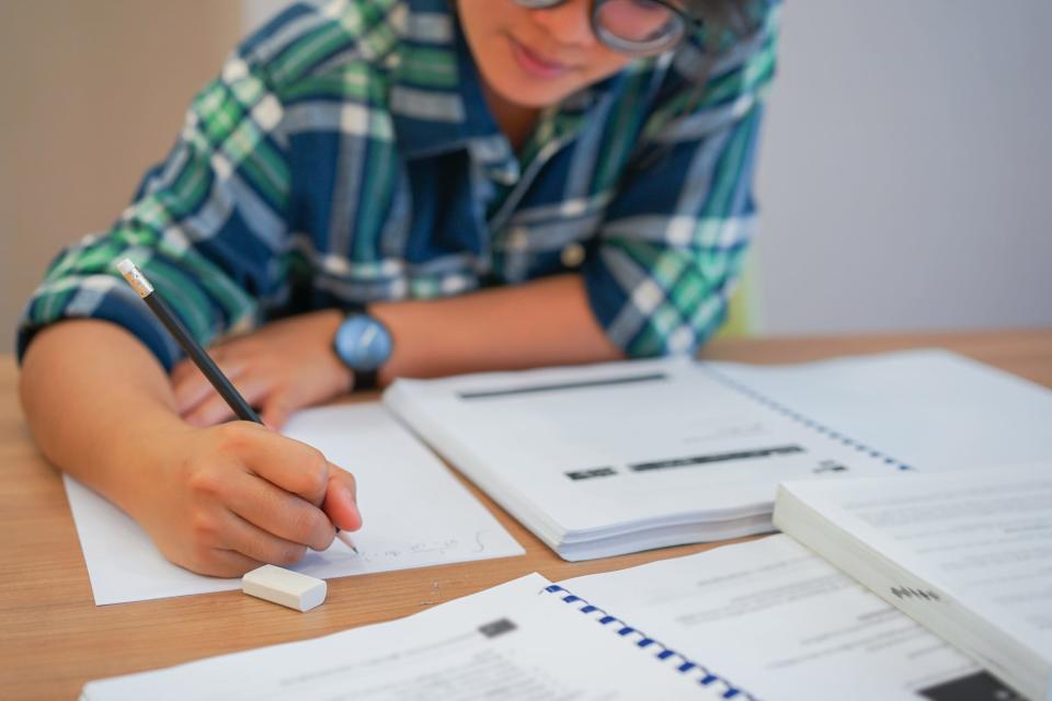 A student works through a calculus problem.